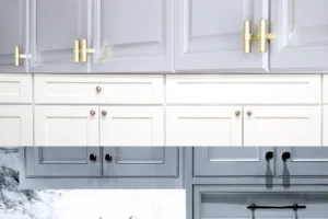 Close-up of black and gold cabinet hardware on kitchen cabinetry